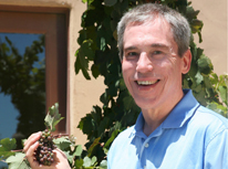 Man holding Grapes